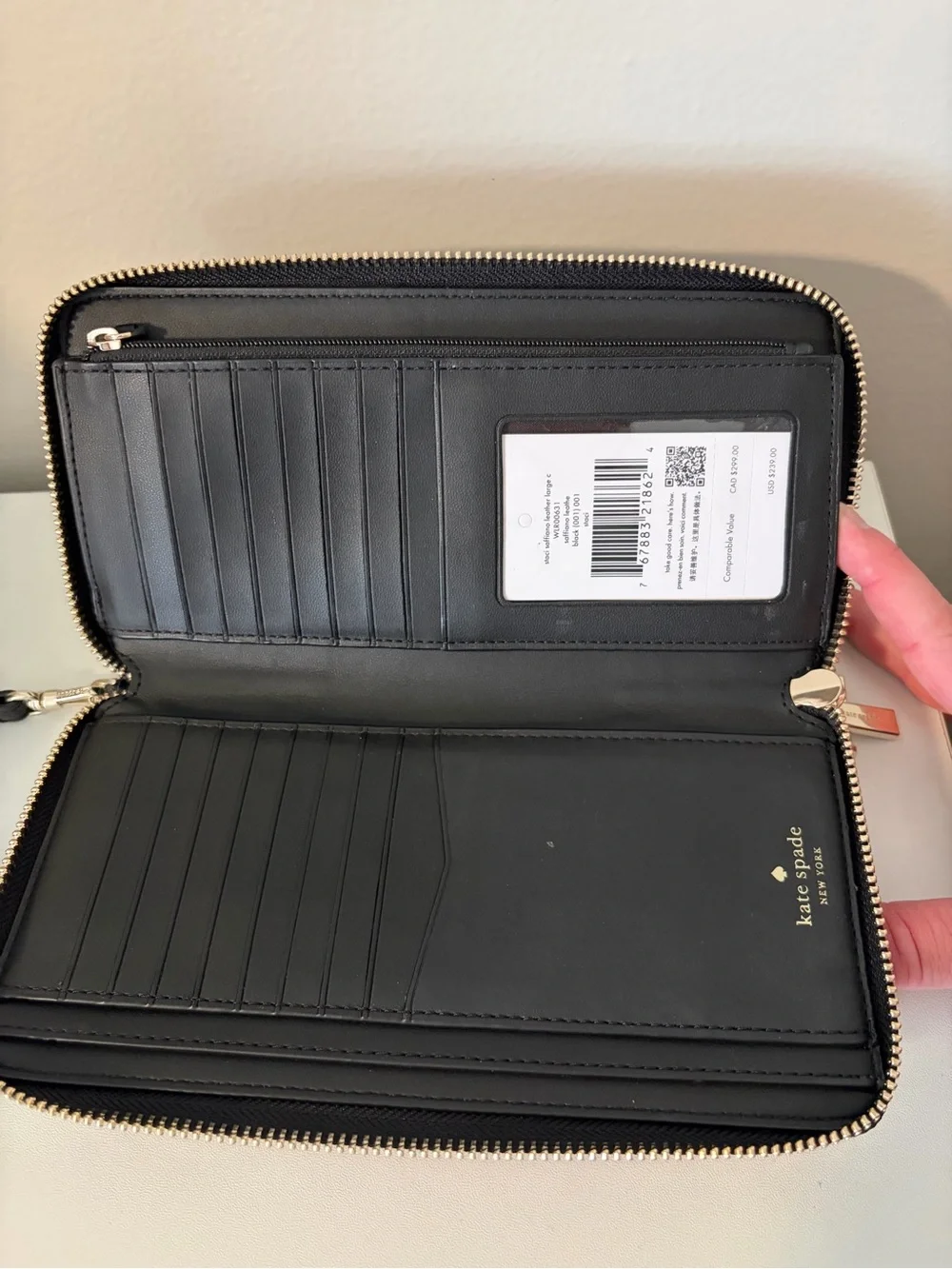 kate spade Black Zip-Around Wristlet Clutch with Gold Hardware